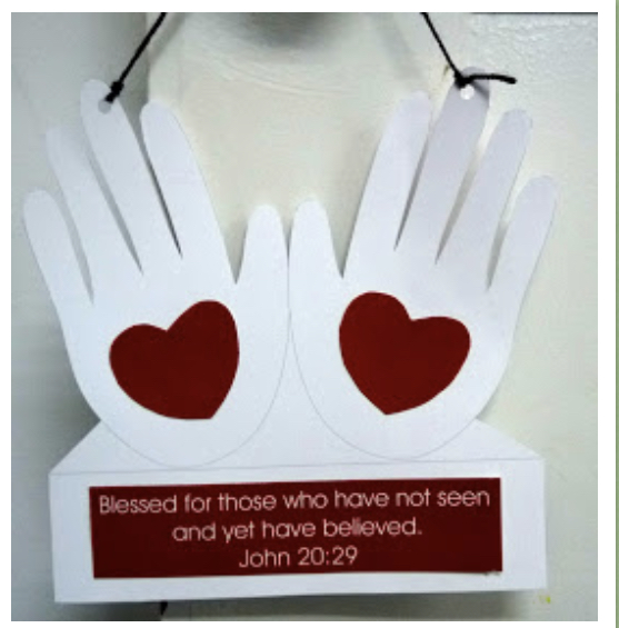 Draw round your hands and cut them out. Place a heart over the palms where Jesus’ wounds were, to help us believe.